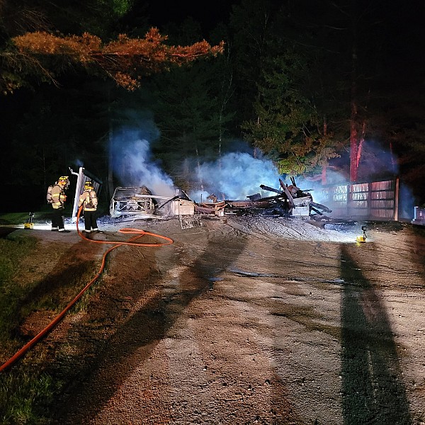 Firefighters battle late night garage fire